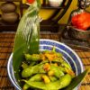 A bowl of steamed edamame beans sprinkled with salt, a classic Japanese starter