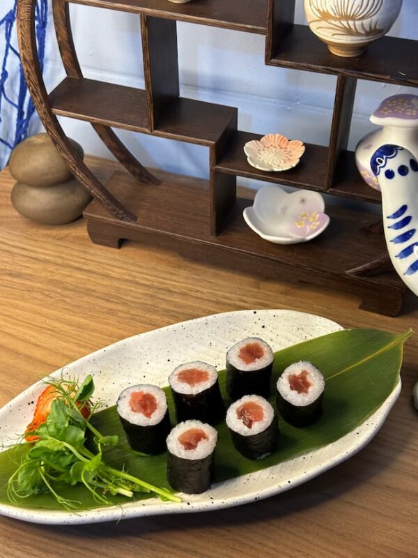 Artfully plated Maki Salmon sushi snack, Edinburgh's choice for a quick and tasty maki meal.