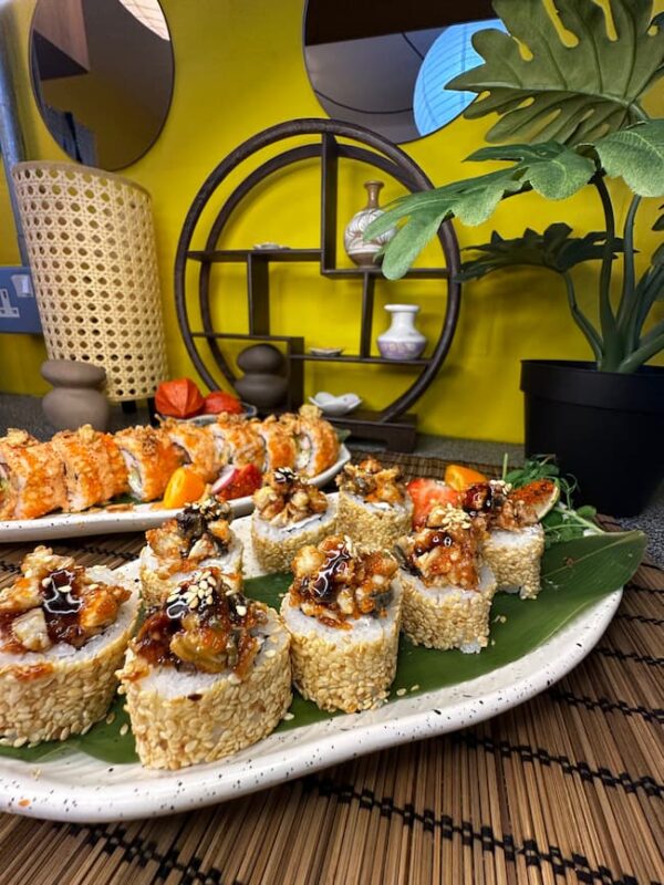 Exquisite Unagi Tartarus sushi garnished with crunchy onions and a drizzle of unagi sauce in an Edinburgh sushi restaurant