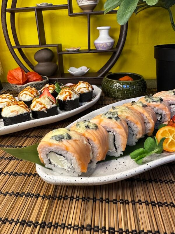 Gourmet Pear Dorblu Roll sushi on a white plate, blending traditional and modern flavors in Edinburgh