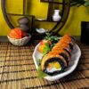 Indulge in the art of sushi with Edinburgh's Phila Mango Black, a fusion of tropical mango and rich salmon on seasoned rice