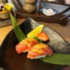 Luxurious Nigiri Tuna with spicy sauce garnish, a premium sushi snack in Edinburgh