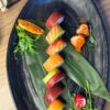 Rainbow Roll with Tuna, Mango, Avocado, Salmon