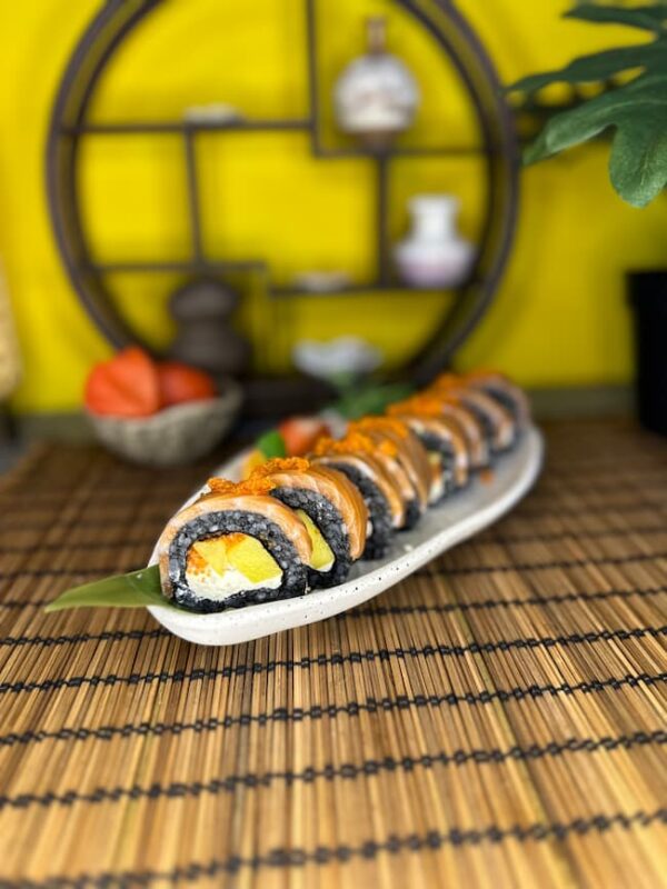 Savor the exotic blend of Phila Mango Black sushi, with lush mango and succulent salmon, a flavorful masterpiece from Edinburgh