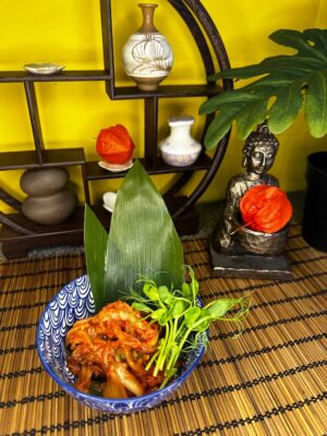 Spicy and tangy Kimchi Cabbage, a perfect complement to any main course, served in a stylish bowl