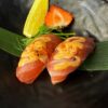 Tantalizing Nigiri Tuna sushi, seasoned with a spicy kick, ready to enjoy in Edinburgh