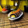 Tropical meets traditional in Edinburgh's Phila Mango Black sushi, featuring ripe mango and creamy cheese for an invigorating meal