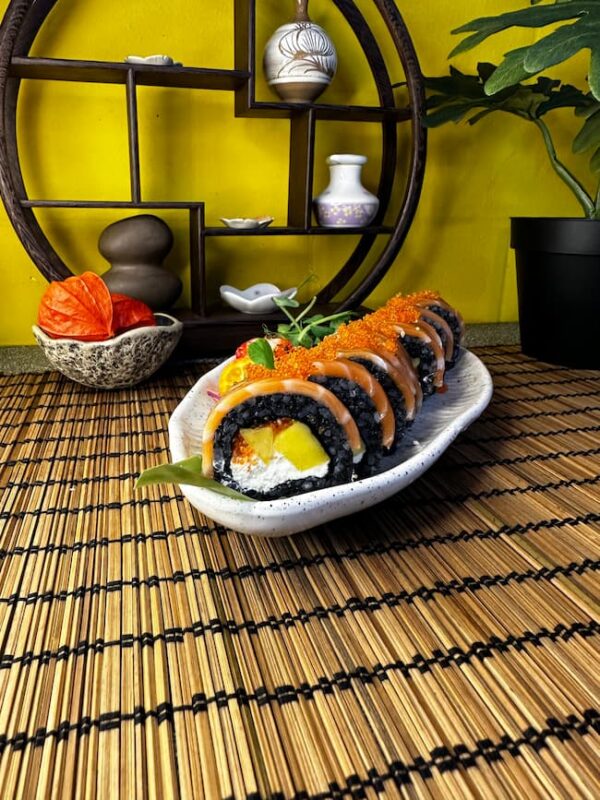 Tropical meets traditional in Edinburgh's Phila Mango Black sushi, featuring ripe mango and creamy cheese for an invigorating meal