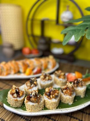 Unagi Tartarus sushi roll, 255g, topped with unagi sauce and sesame seeds, served on a green leaf at Edinburgh sushi spot