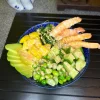 Close-up of Edinburgh's Shrimp Poke showcasing succulent shrimp