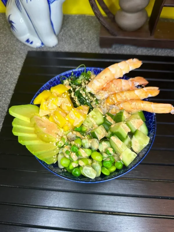 Close-up of Edinburgh's Shrimp Poke showcasing succulent shrimp