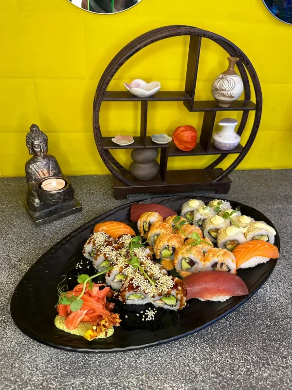 Close-up of salmon and tuna nigiri with sesame and tobiko on California Sushi Platter in Edinburgh.